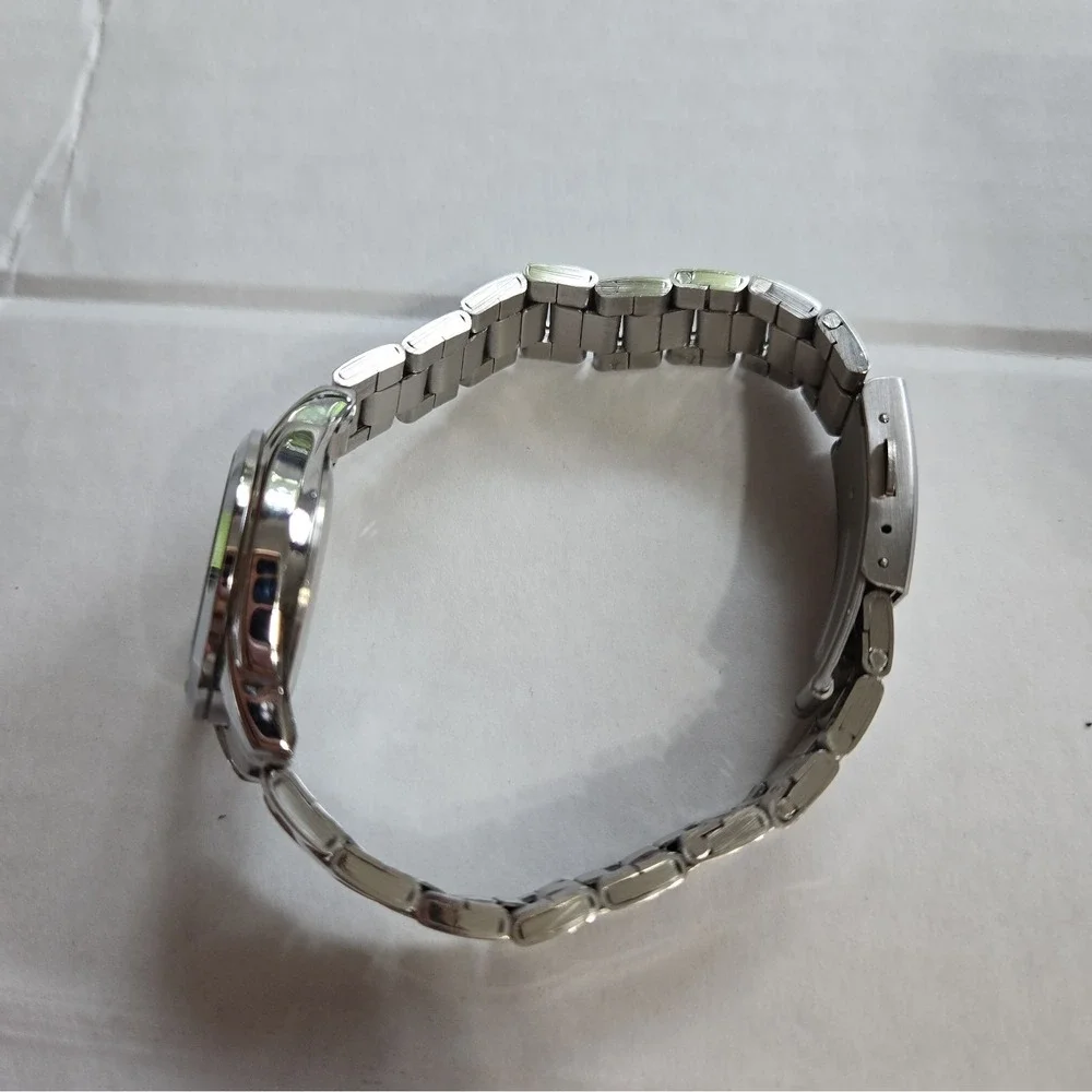 Chenxi CX021L Women's Quartz Watch Light Blue Dial,SS Band,Rhinestone Markers.